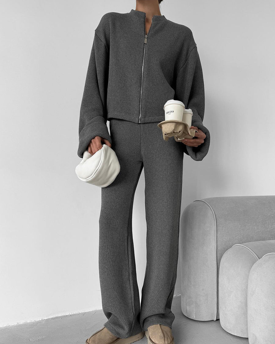 Gray knit lounge set styled with casual beanie and slippers