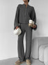 Gray knit lounge set styled with casual beanie and slippers