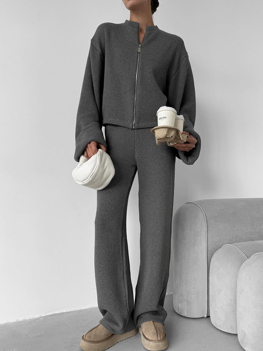 Gray knit lounge set styled with casual beanie and slippers