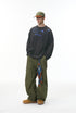 Model in gray "NO More Ideas" oversized long sleeve t-shirt full body