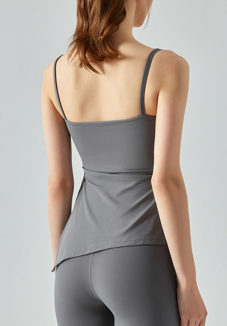 Back of gray yoga tank top with smooth finish and built-in bra design.