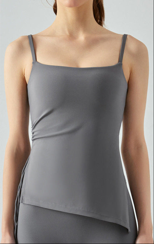 Woman in titanium gray cooling tank top featuring side ruching.