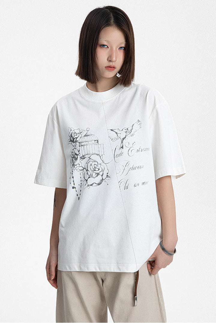 Medium shot of a model wearing a white relaxed crewneck t-shirt with hand-drawn sketch artwork.