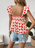 Back view of heart print bow top with ruffle straps