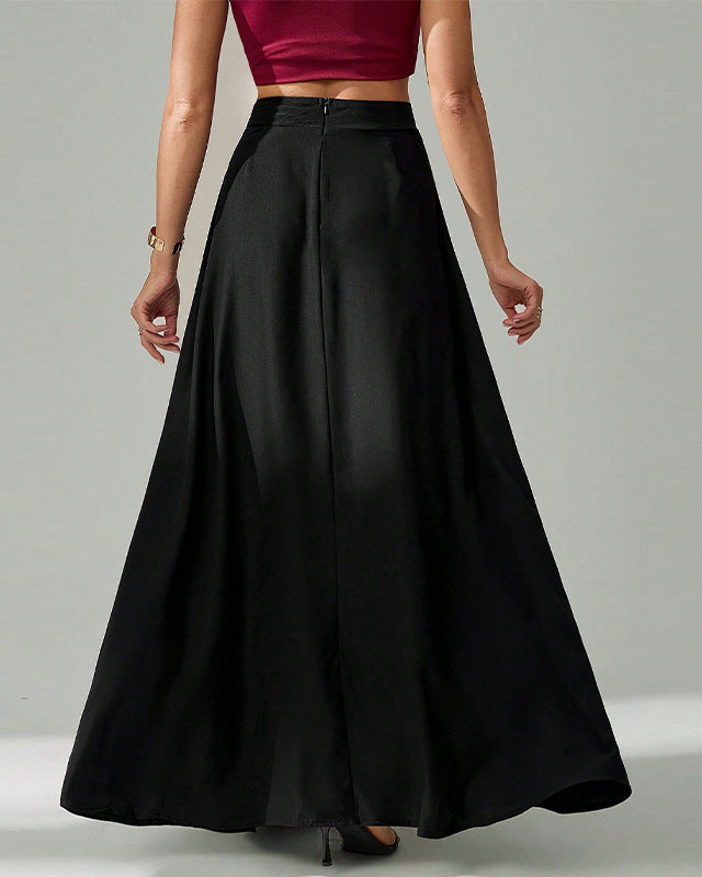 angled back view of high-waist black long skirt showing flowy drape
