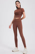 Chestnut brown seamless workout leggings with high rise and sculpting effect.