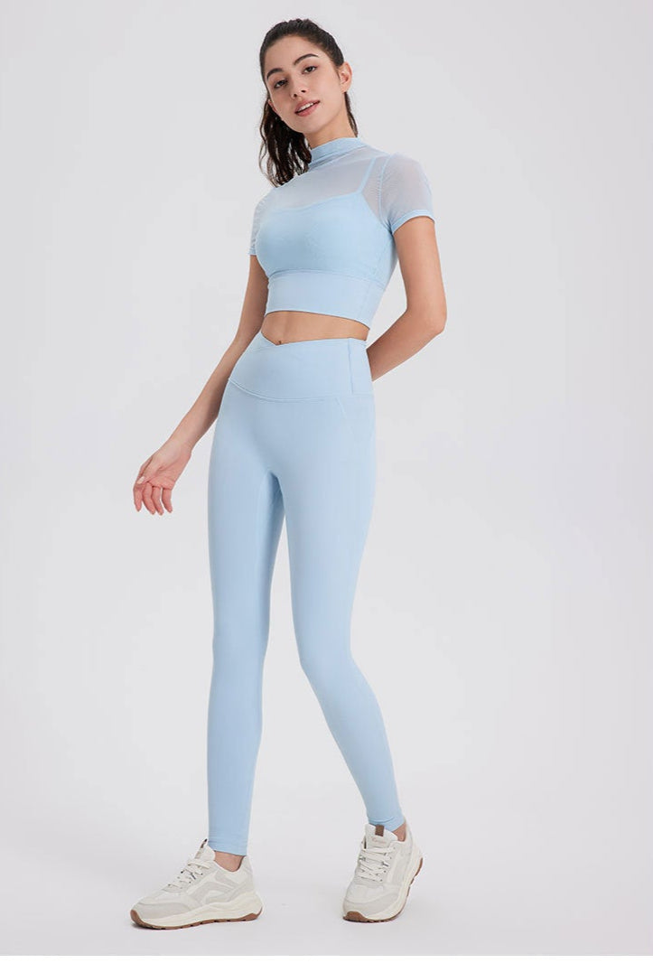 Light blue high waisted seamless workout leggings with peach-lift design.