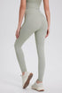 Sage green high waisted seamless workout leggings with peach-lift design.