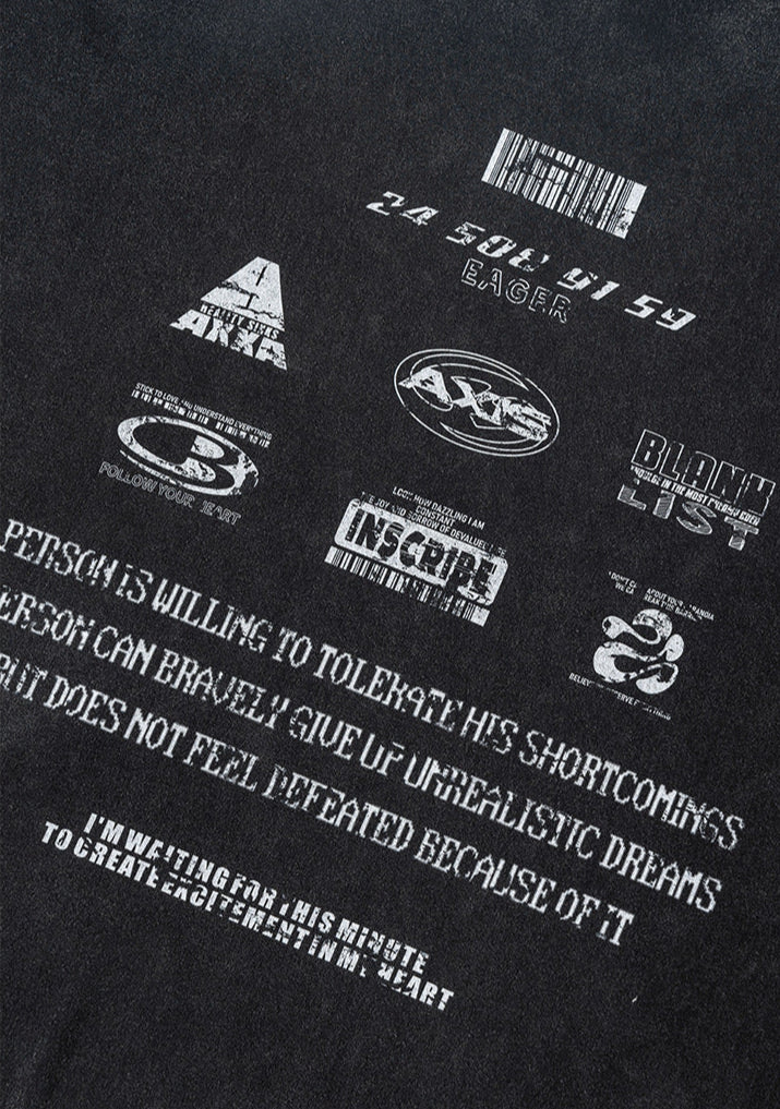 Angled back print detail highlighting layered logos and faded text.