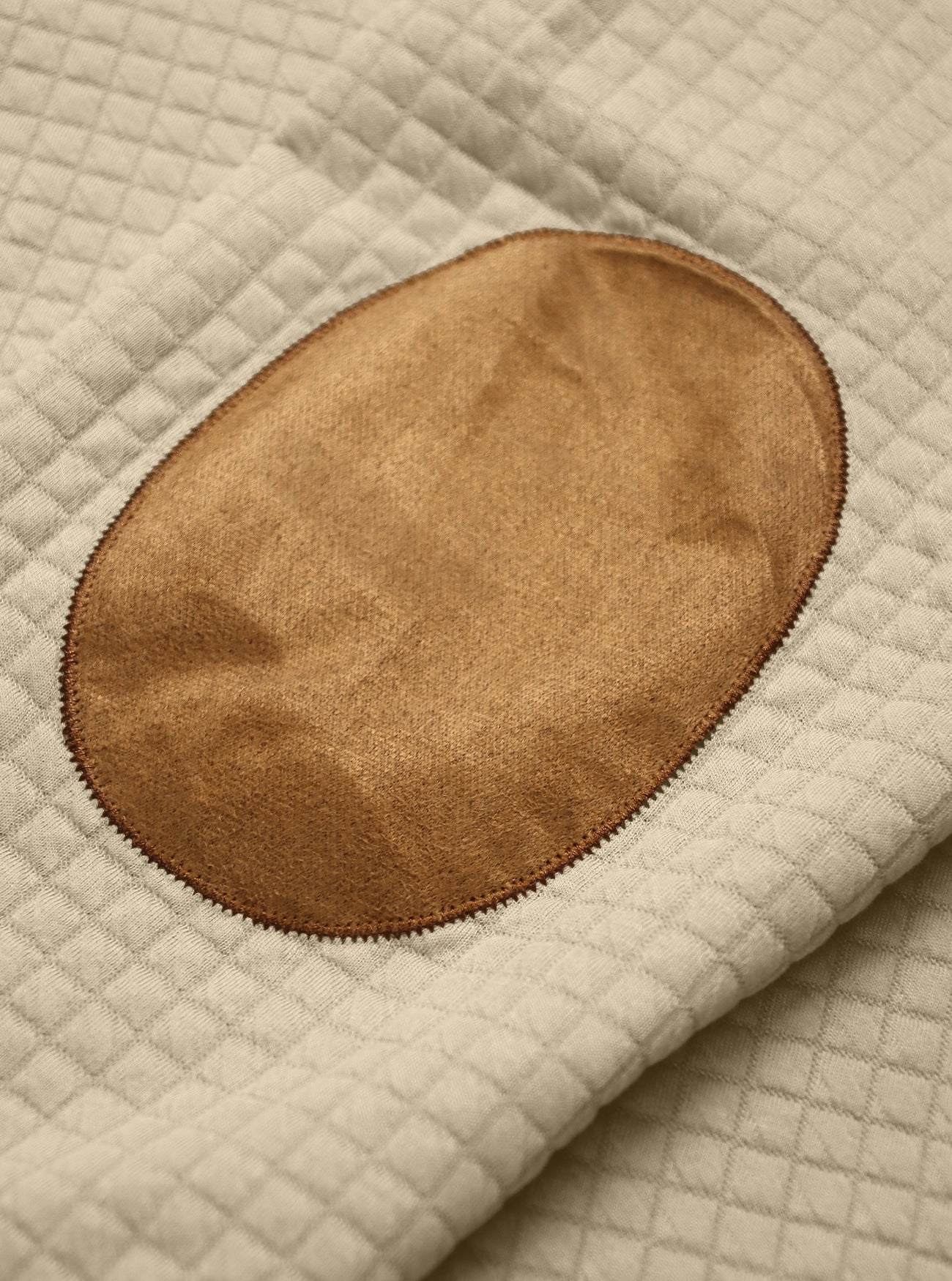 khaki sweatshirt with zip for men showing suede elbow patch detail