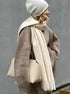 Khaki knit 2 piece set with half zip sweater and wide leg pants outdoors