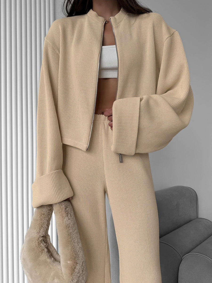 Khaki lounge set styled with plush bag