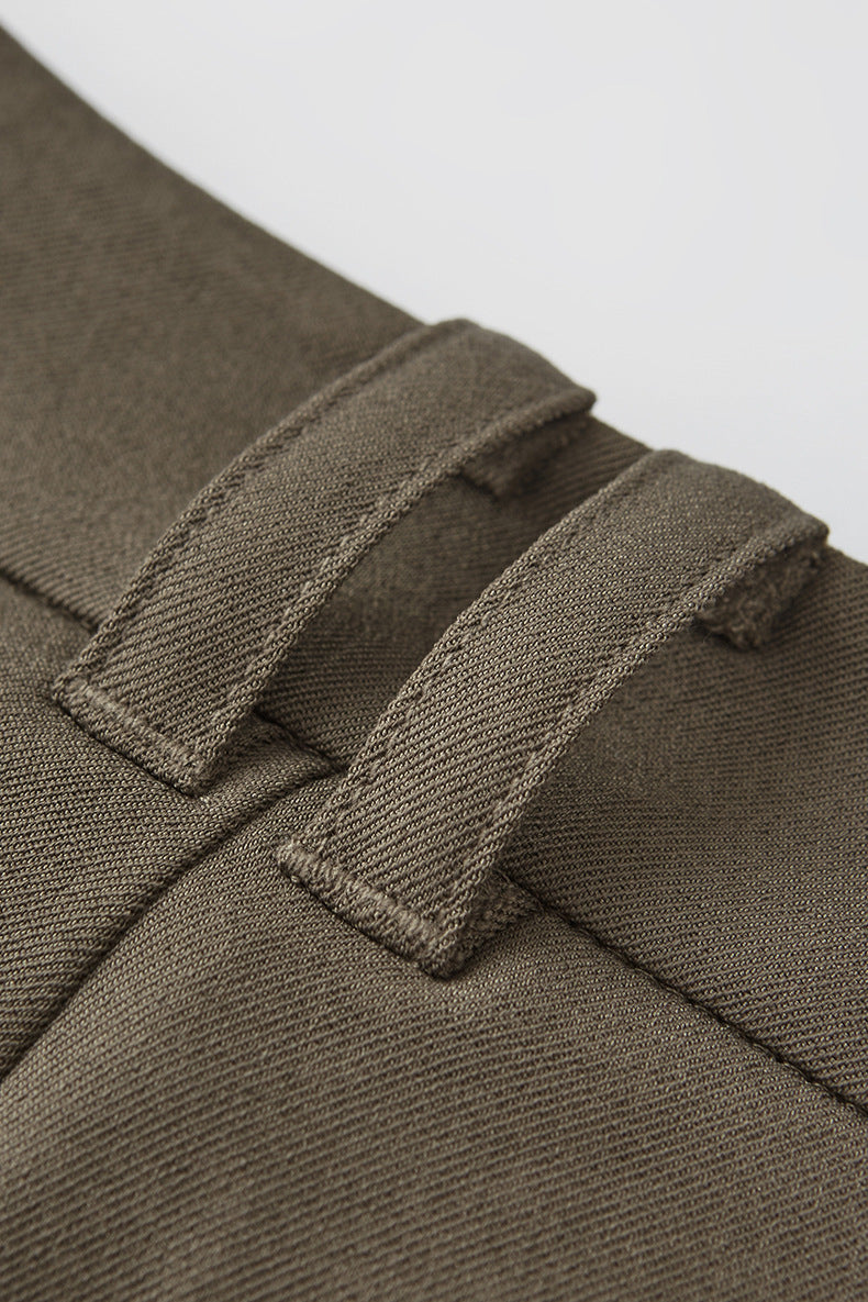 Belt loop close-up of khaki mens dress pants