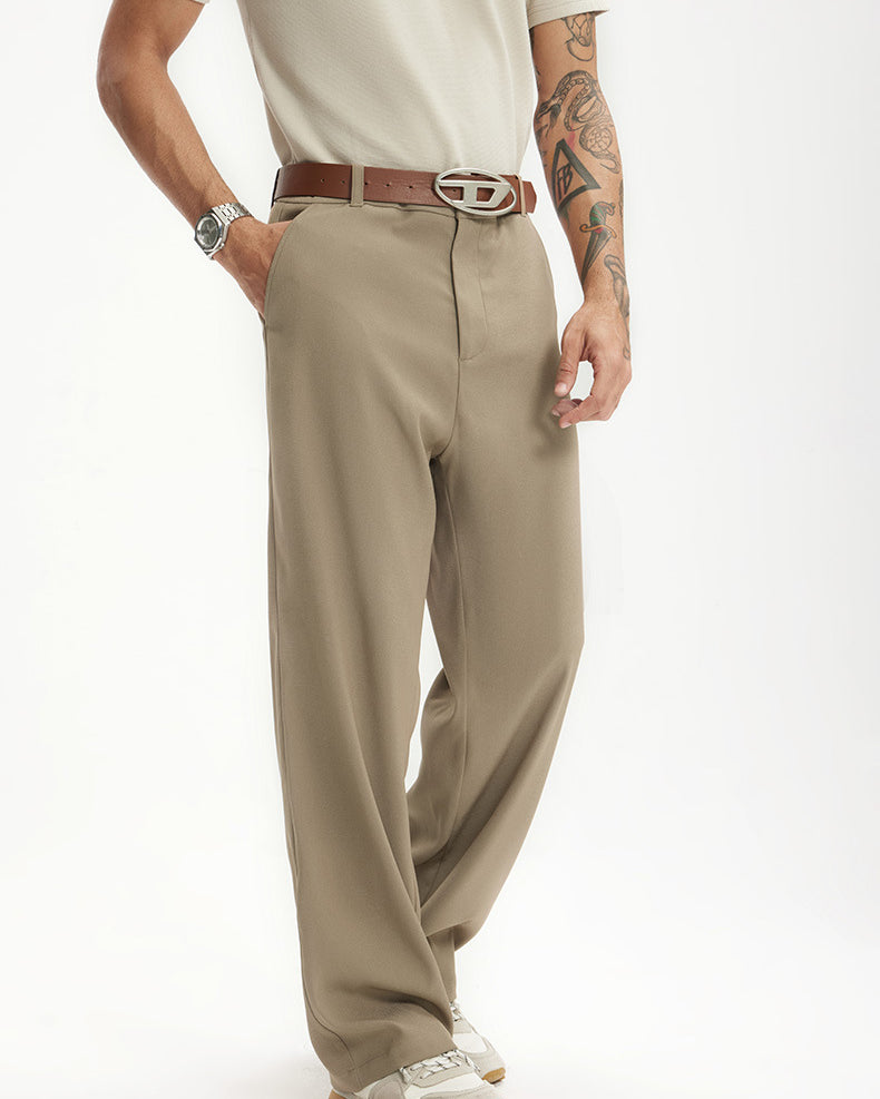 Close-up of khaki mens dress pants front fit and belt detail