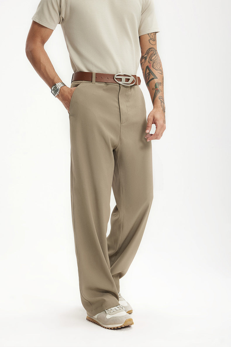 Close-up of khaki mens dress pants front fit and belt detail