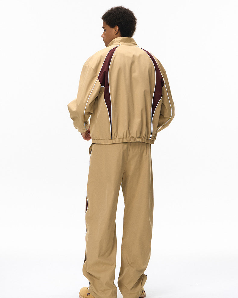 Khaki tracksuit back view, racing jacket panels and wide leg pants