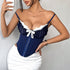 Navy blue corset with white lace bust and bow, captured in mirror selfie.