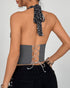 Back view of halter corset top with leopard print tie and gray lace-up back detail.