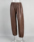 Light brown PU pants front view