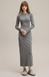 Light gray long sleeve bodycon maxi dress, three-quarter angle.