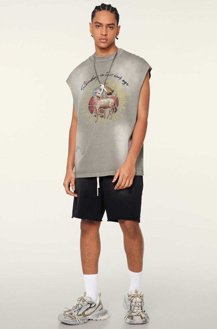 Model in light grey ram tee and black shorts with white sneakers