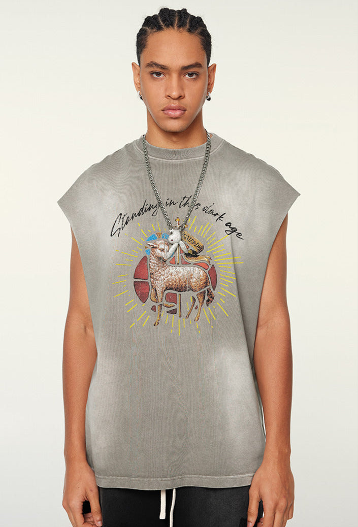 Model stands facing front in light gray tribal ram tee
