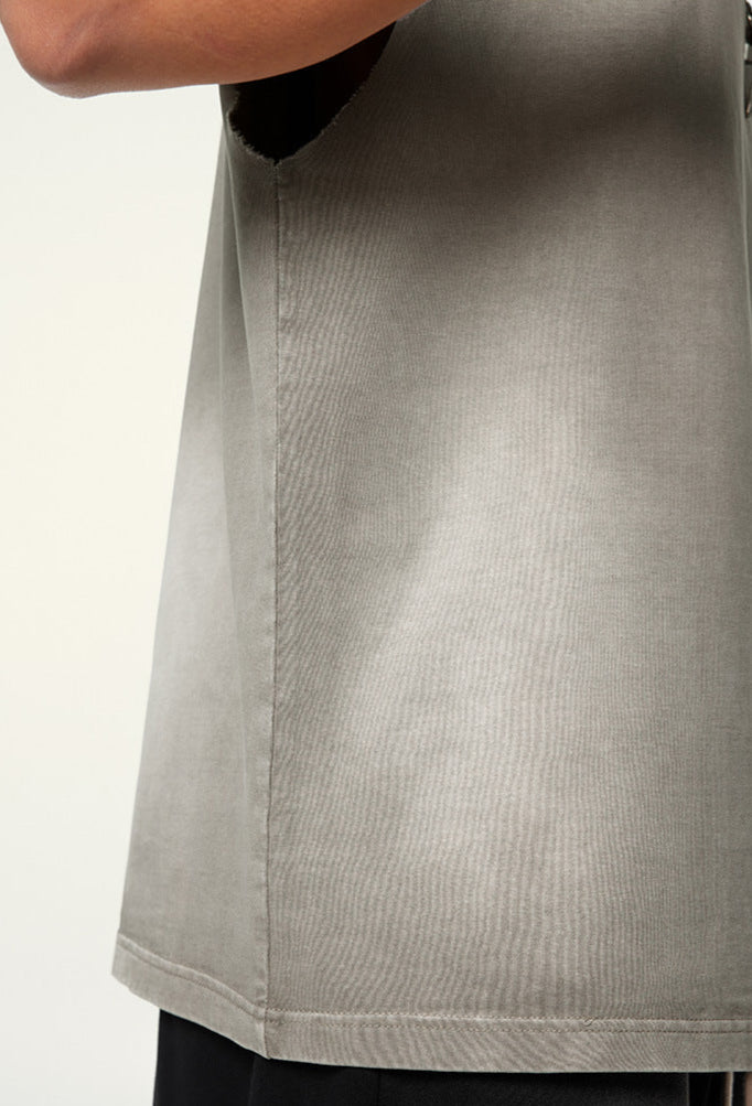 Side seam and fabric texture of light gray sleeveless tee