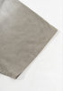 Hem and sleeve edge stitching detail on light grey tee.