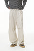 Linen wide-leg trousers in light beige with drawstring waist, relaxed streetwear fit