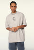 Men wearing cream t-shirt with “LOADING...” spinner graphic on front.