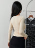 back view long sleeve crop top, light almond, ruched sides, slim fit, hip-skimming length
