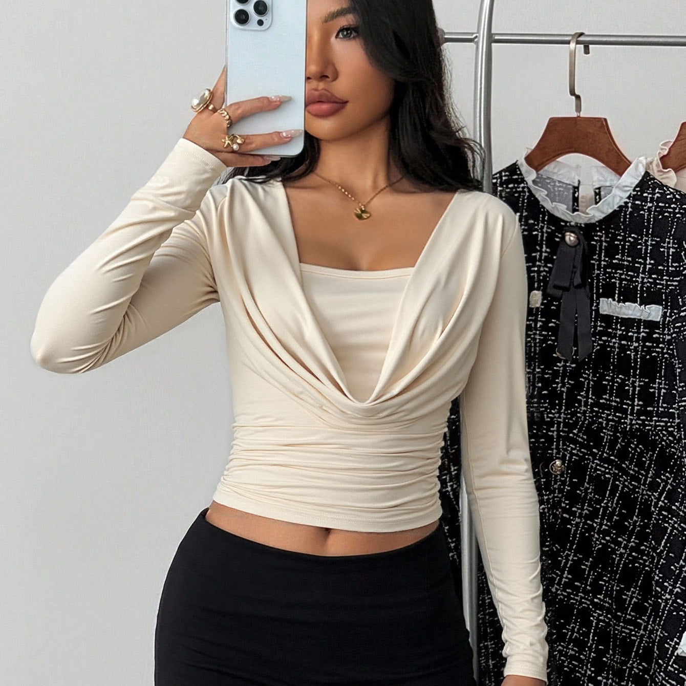 long sleeve crop top on model, light almond, draped cowl square neck, ruched waist, slim fit front view