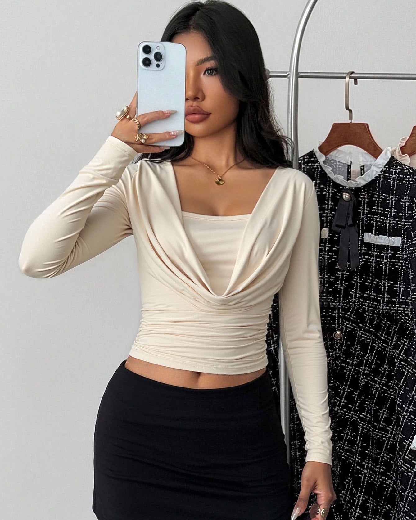 long sleeve crop top on model, light almond, draped cowl square neck, ruched waist, slim fit front view