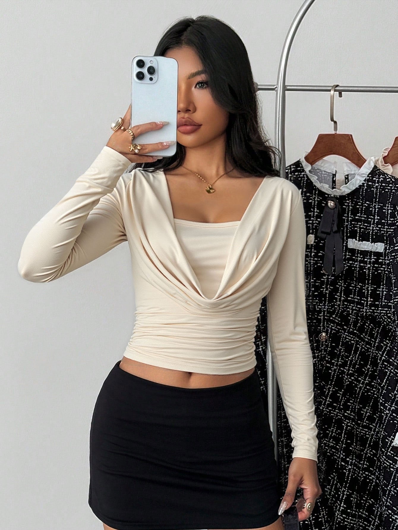 long sleeve crop top on model, light almond, draped cowl square neck, ruched waist, slim fit front view