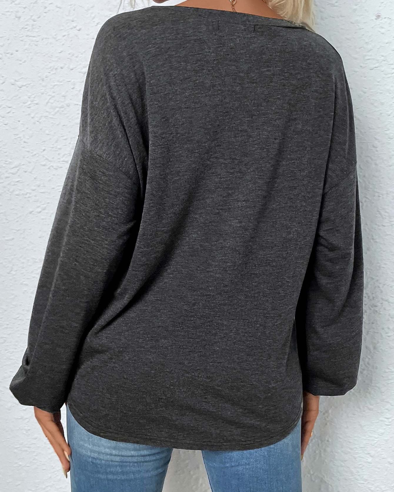 back view, relaxed fit mélange henley long sleeve tee with curved hem
