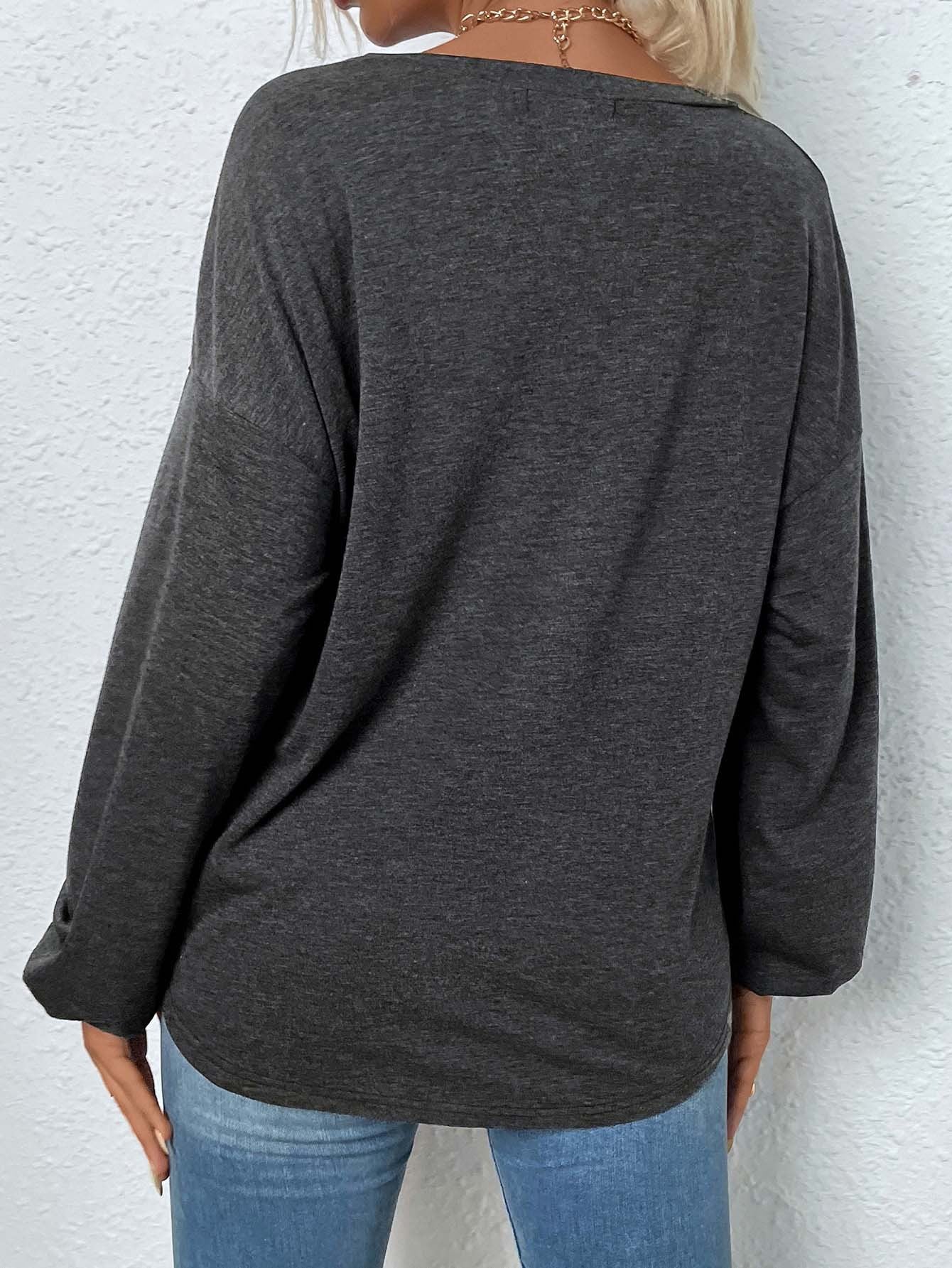 back view, relaxed fit mélange henley long sleeve tee with curved hem