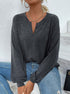 seated pose, women’s mélange long sleeve henley tee, split button neckline, casual styling