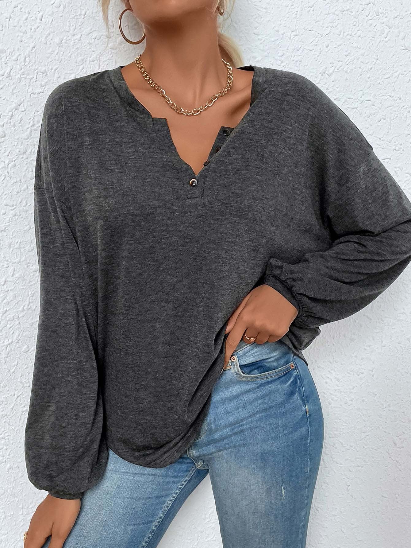 three-quarter angle, mélange henley shirt with split neck and blouson sleeves, relaxed drape