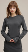 Women’s long sleeve tee solid color raglan crewneck mid shot front (dark gray)