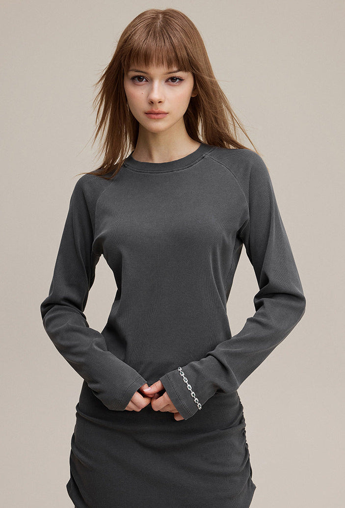 Women’s long sleeve tee solid color raglan crewneck mid shot front (dark gray)
