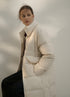 Long over-knee white down coat with snap button closure