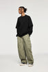 Man in oversized black long sleeve t-shirt with layered effect