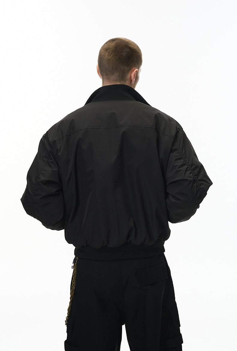 Back view—black men bomber jacket with rib hem and clean seam