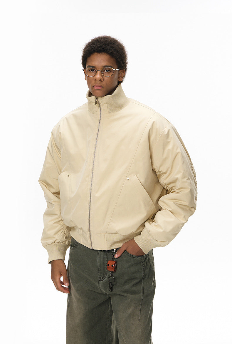 Black bomber jacket with burgundy quilted lining, zip open