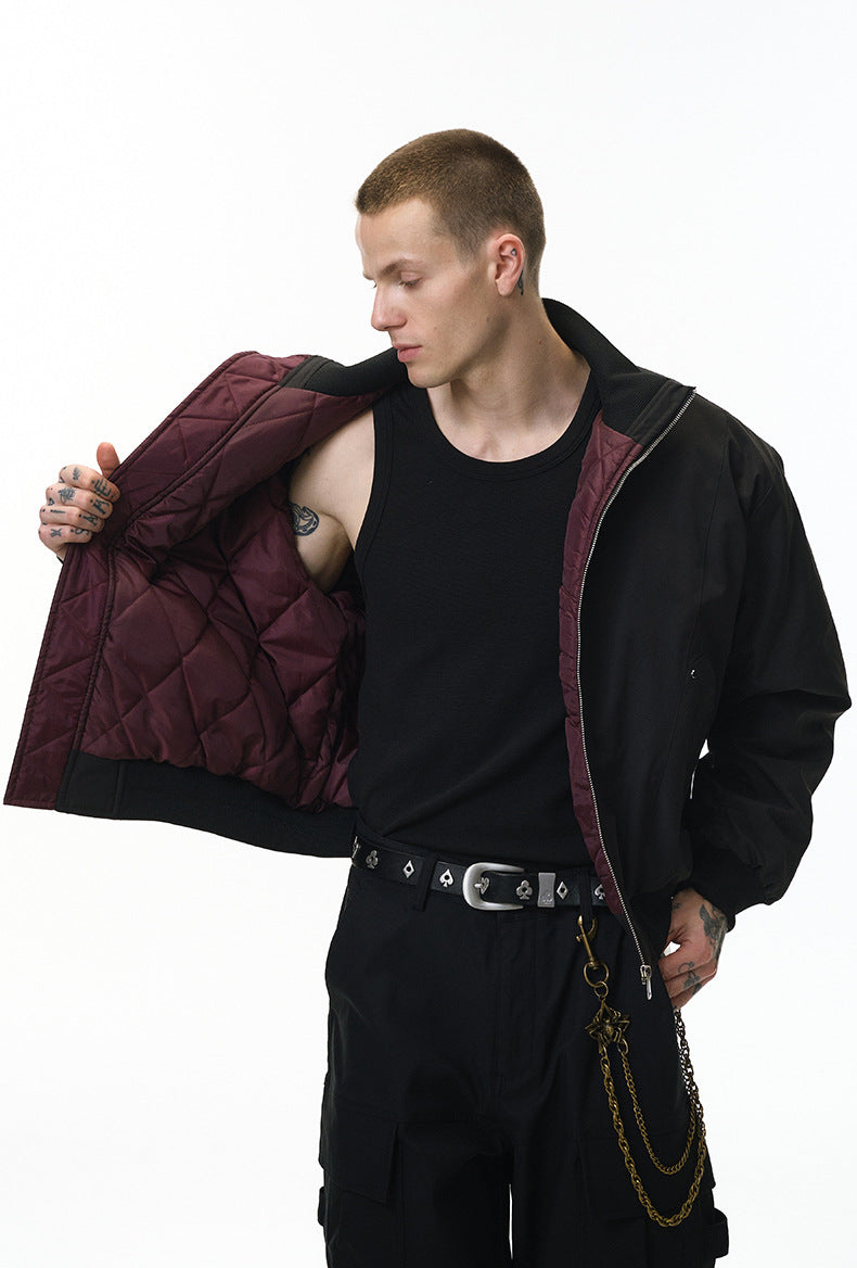 Black bomber jacket, hands in pockets, clean street fit