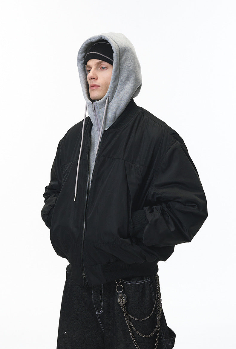 Black bomber jacket side view, dropped shoulder, loose sleeve