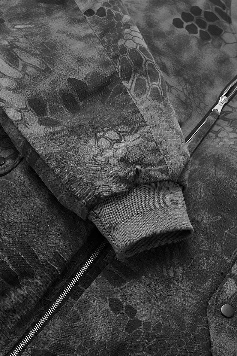 Rib cuff and sleeve seam detail on dark gray bomber jacket