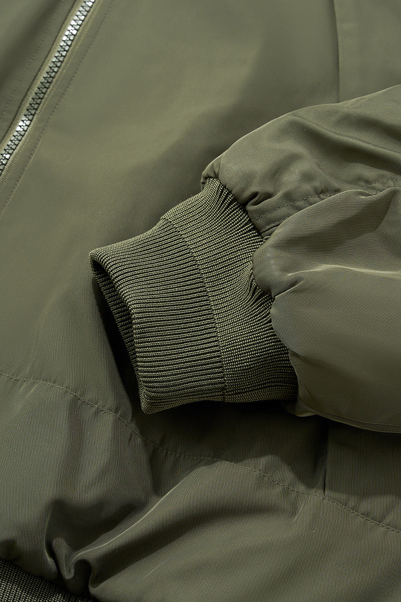 Ribbed cuff and sleeve detail on olive bomber jacket