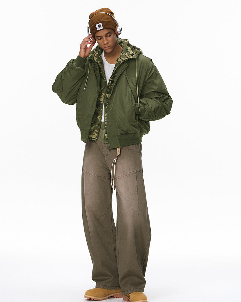 Man in olive men bomber jacket, zip open, relaxed street fit