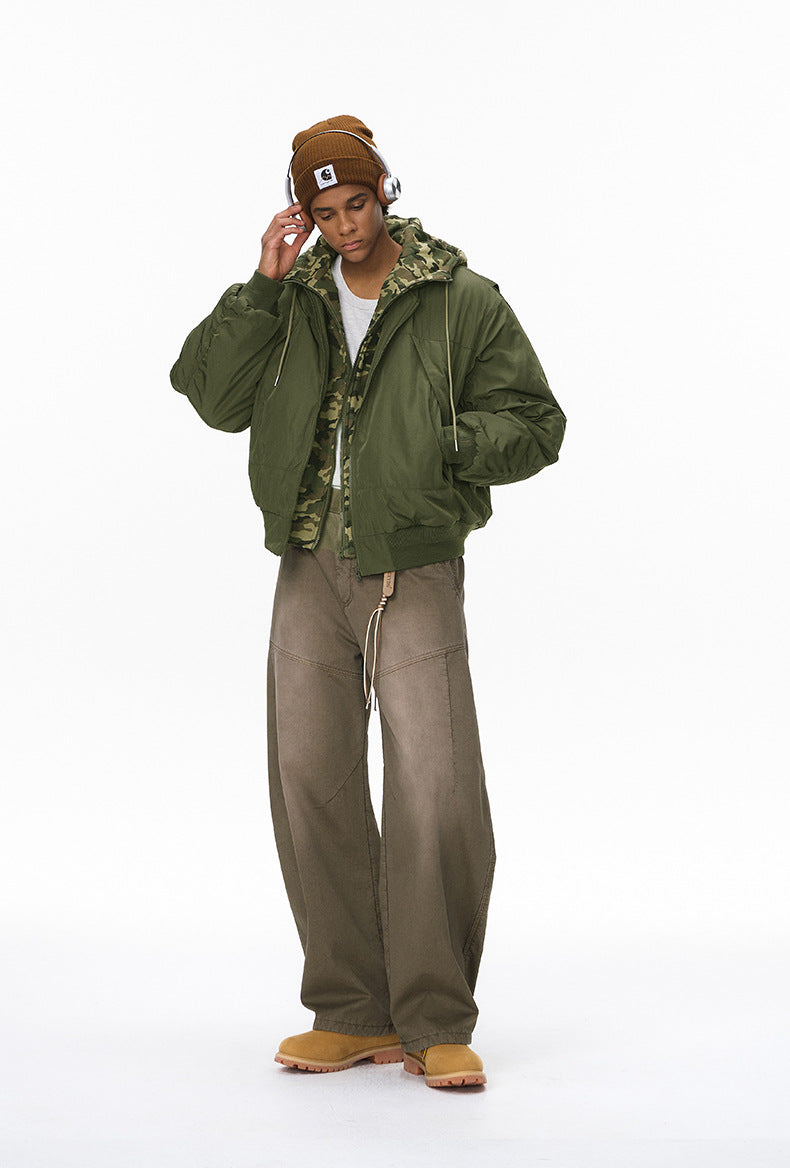 Man in olive men bomber jacket, zip open, relaxed street fit
